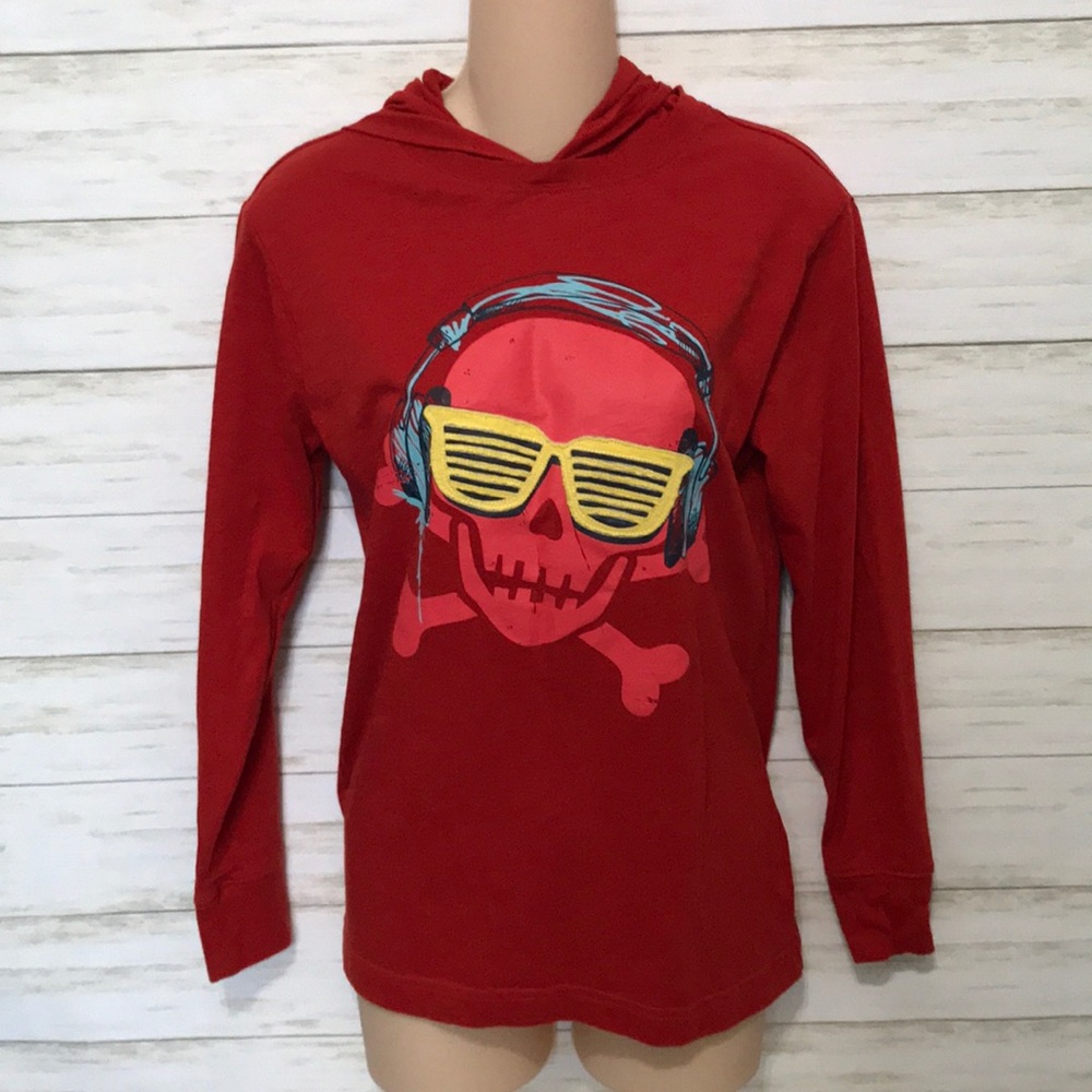 Circo skeleton wearing headphones red hoodie